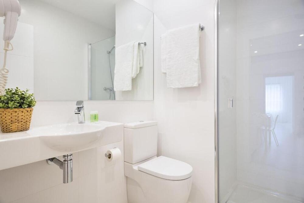 Foto del baño de Aparthotel BcnStop Sagrada Familia