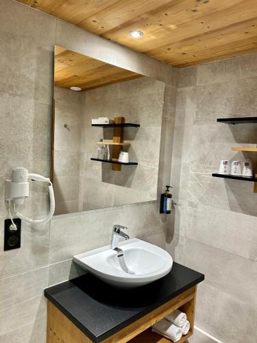 Foto del baño de Chalet Hôtel Les Prodains