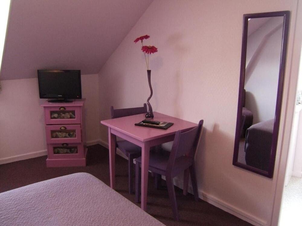 Foto de una habitación de Hôtel de la Plage