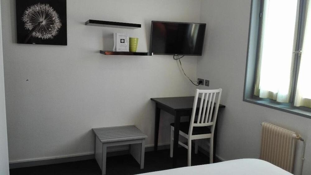 Foto de una habitación de Hôtel de la Plage