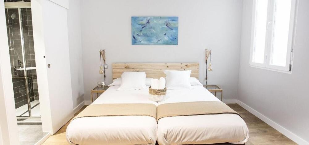 Foto de una habitación de Albergue Hola Rooms