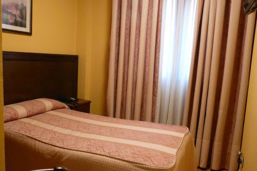 Foto de una habitación de Hotel Idh Angel