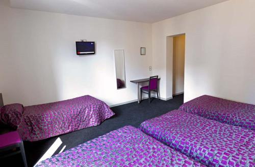 Foto de una habitación de Hôtel Saint Etienne