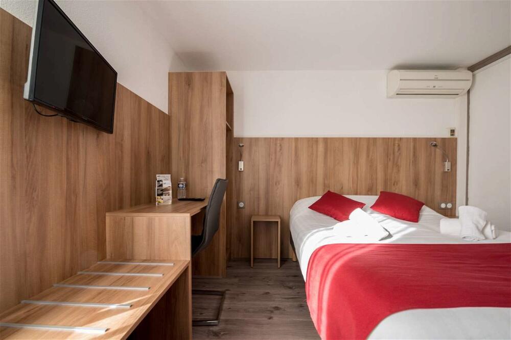 Foto de una habitación de Brit Hotel Plaisance