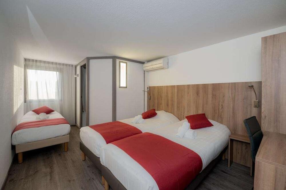 Foto de una habitación de Brit Hotel Plaisance