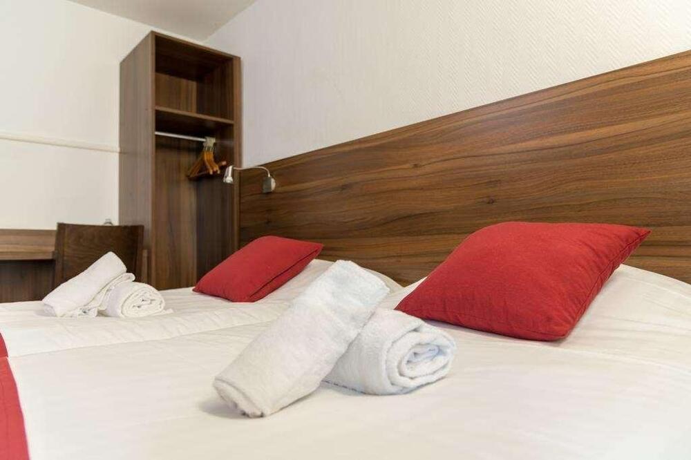 Foto de una habitación de Brit Hotel Plaisance