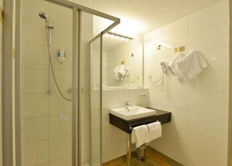 Foto del baño de INVITE Hotel Nürnberg City