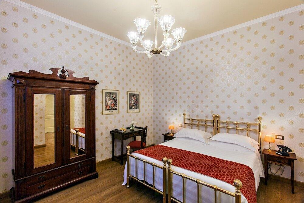 Foto de una habitación de Hotel Pendini