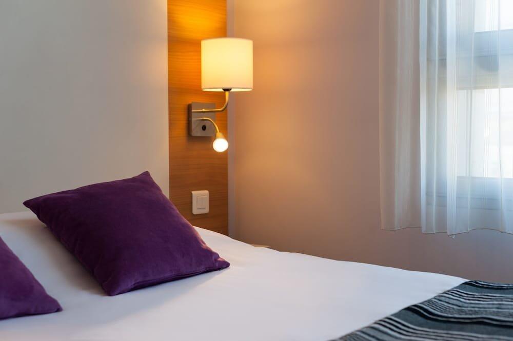 Foto de una habitación de The Originals City, Hôtel Continental, Poitiers (Inter-Hotel)