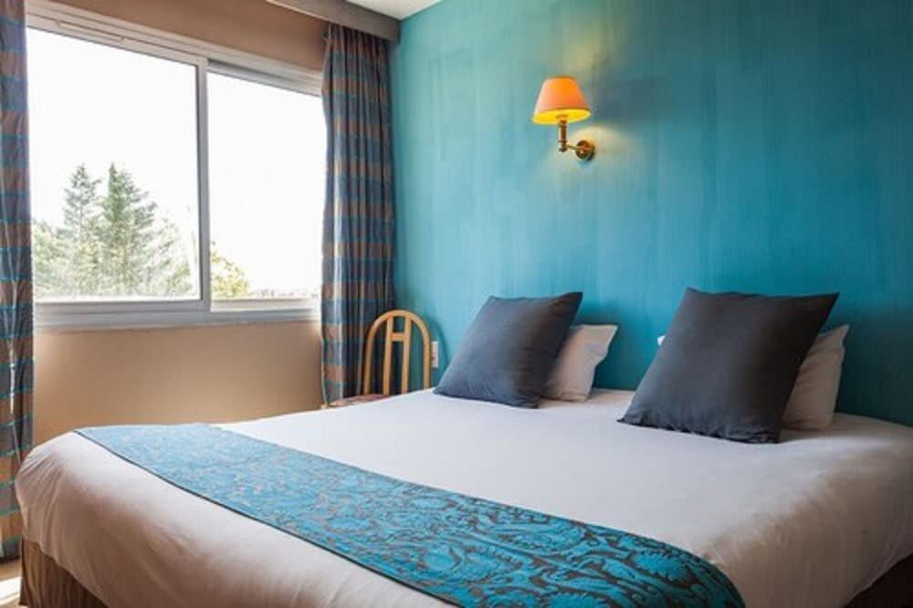 Foto de una habitación de Hôtel Nîmotel