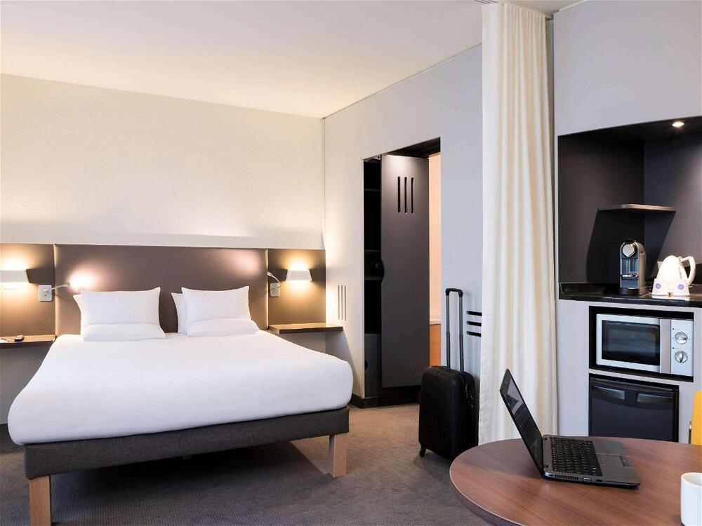 Foto de una habitación de Hotel Novotel Suites Paris Stade De France