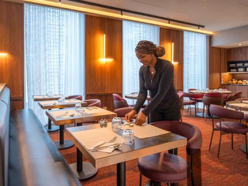 Foto de restauración de Hotel Novotel Spa Rennes Centre Gare