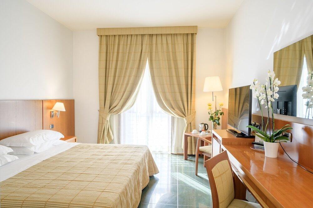 Foto de una habitación de Hotel dei Principati