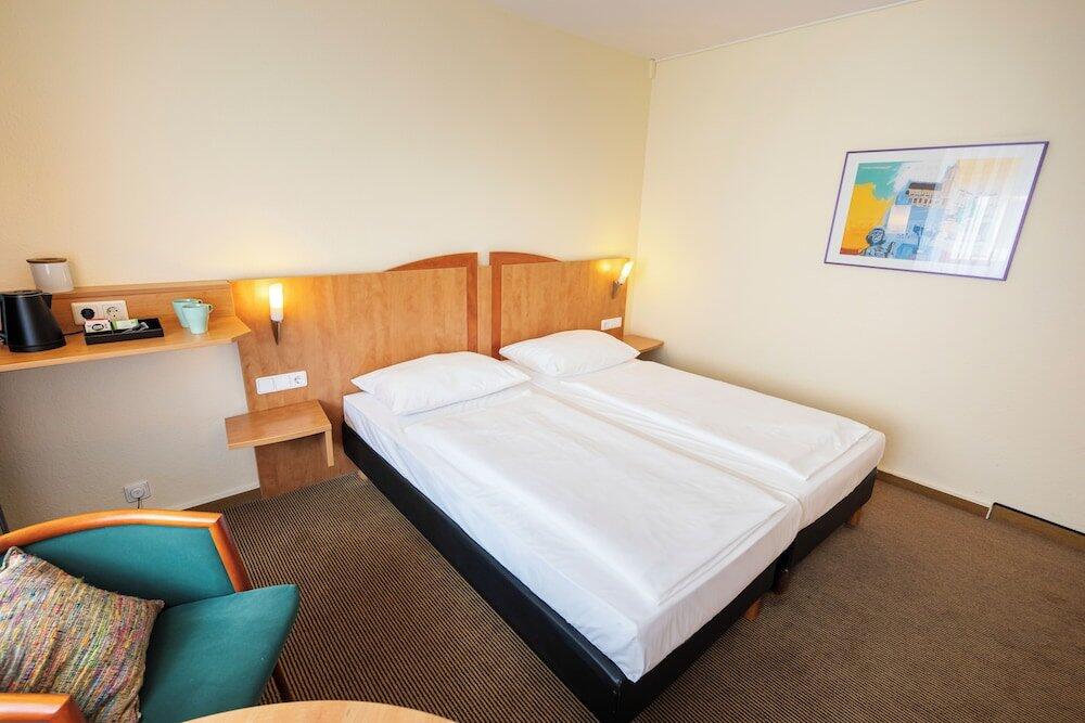 Foto de una habitación de Michel Hotel Braunschweig (ehem. Mercure Hotel Atrium)