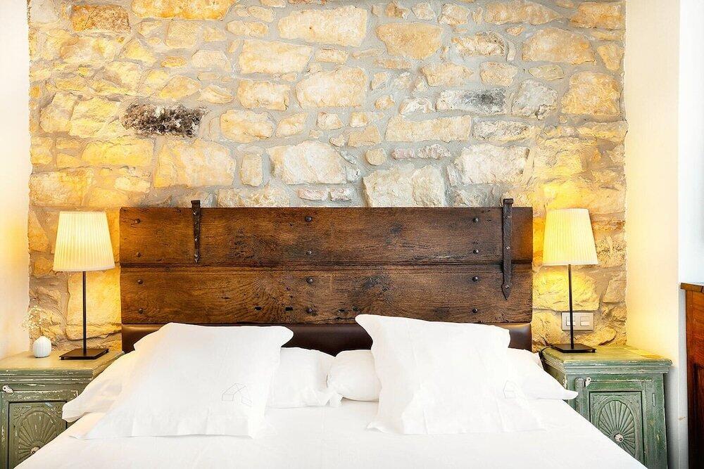 Foto de una habitación de Okako Hotel