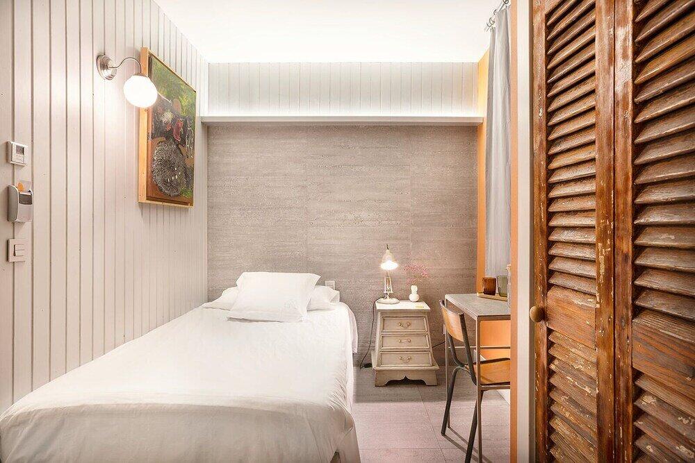 Foto de una habitación de Okako Hotel