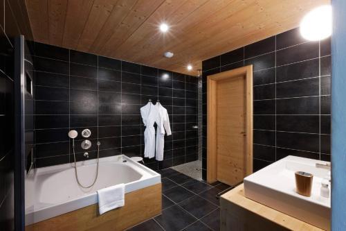Foto del baño de Hotel Flocons De Sel