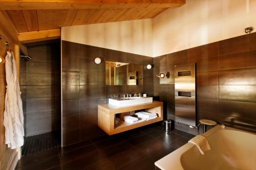 Foto del baño de Hotel Flocons De Sel