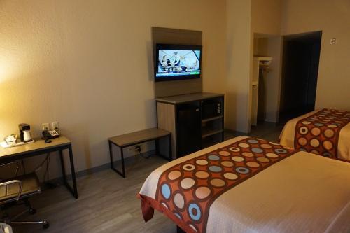 Foto de una habitación de Hotel Super 8 by Wyndham Pennsville/Wilmington