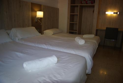 Foto de una habitación de Hostal La Cabanya