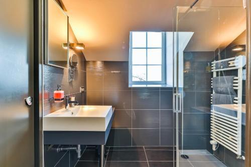 Foto del baño de Hostal Maison Marie Barrault