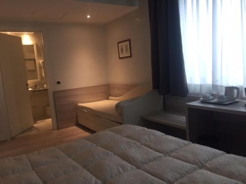 Foto de una habitación de Hostellerie Du Cheval Blanc
