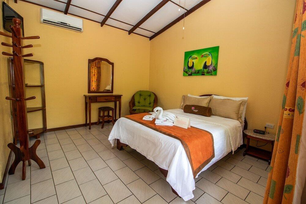 Foto de una habitación de Hotel La Rosa de America