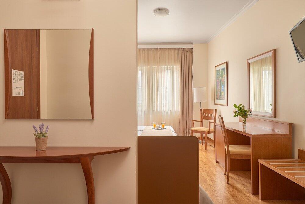 Foto de una habitación de Hotel Athos