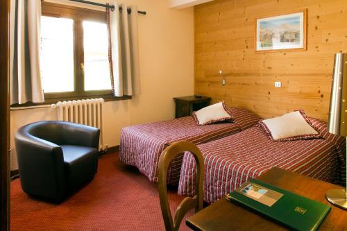Foto de una habitación de Hotel Le Castillan