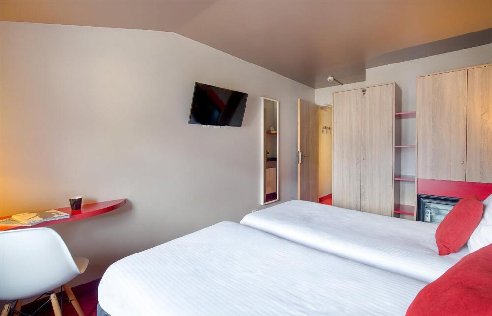 Foto de una habitación de SOWELL HOTELS Le Parc &amp;amp; Spa