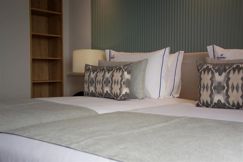 Foto de una habitación de VIP Executive Suites do Marquês Hotel
