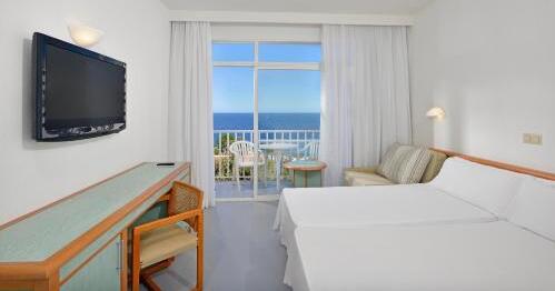 Foto de una habitación de Hotel AluaSun Cala Antena - All Inclusive