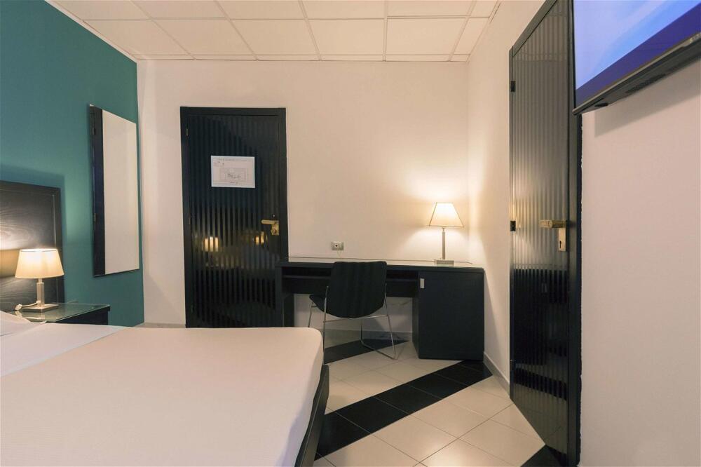 Foto de una habitación de Executive Business Hotel