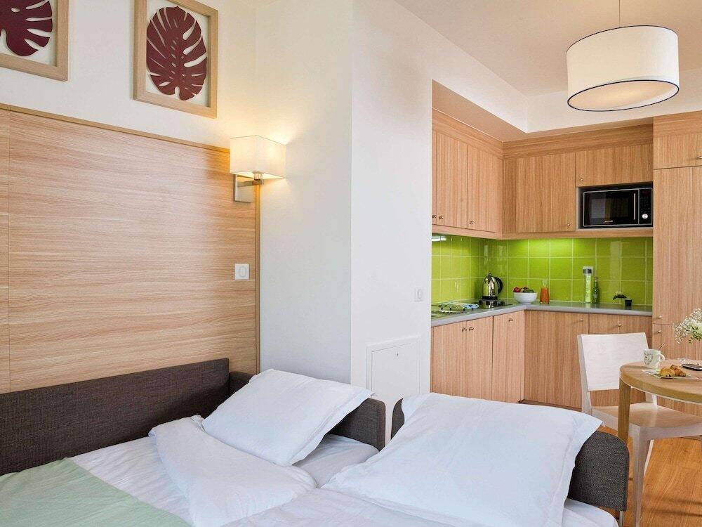 Foto de una habitación de Aparthotel Adagio Paris Vincennes