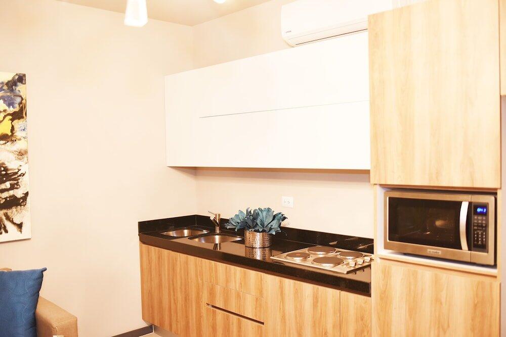 Foto de una habitación de Aparthotel Marina Suites