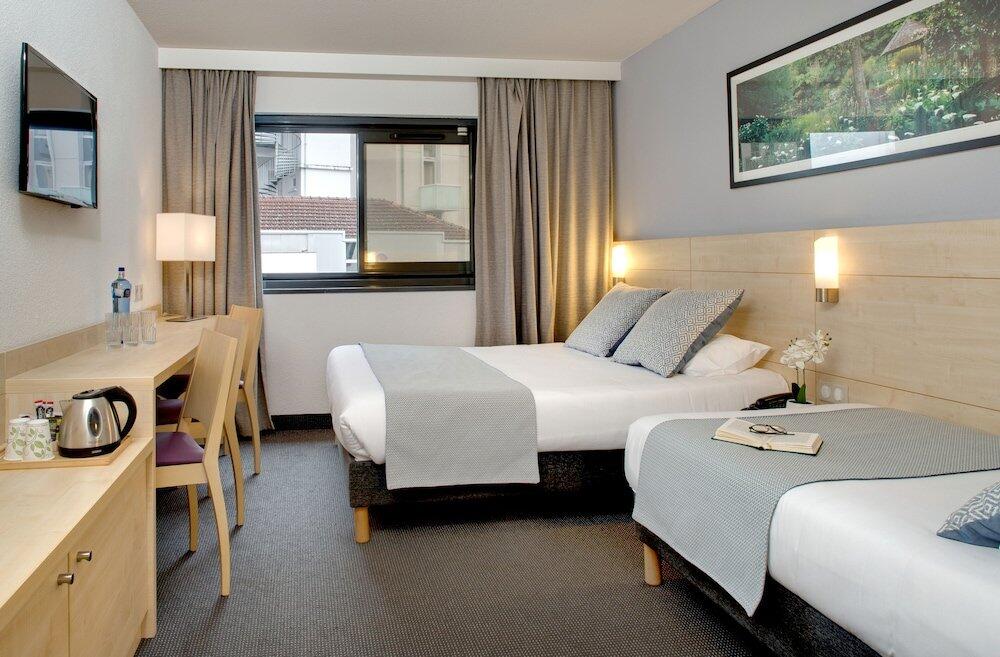 Foto de una habitación de Hôtel Padoue