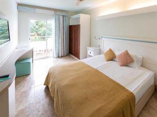 Foto de una habitación de Hotel Bahia del Sol