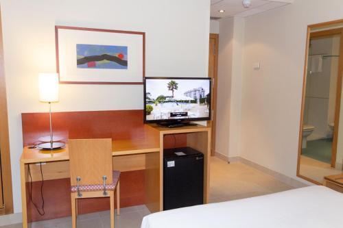 Foto de una habitación de Hotel Canelas