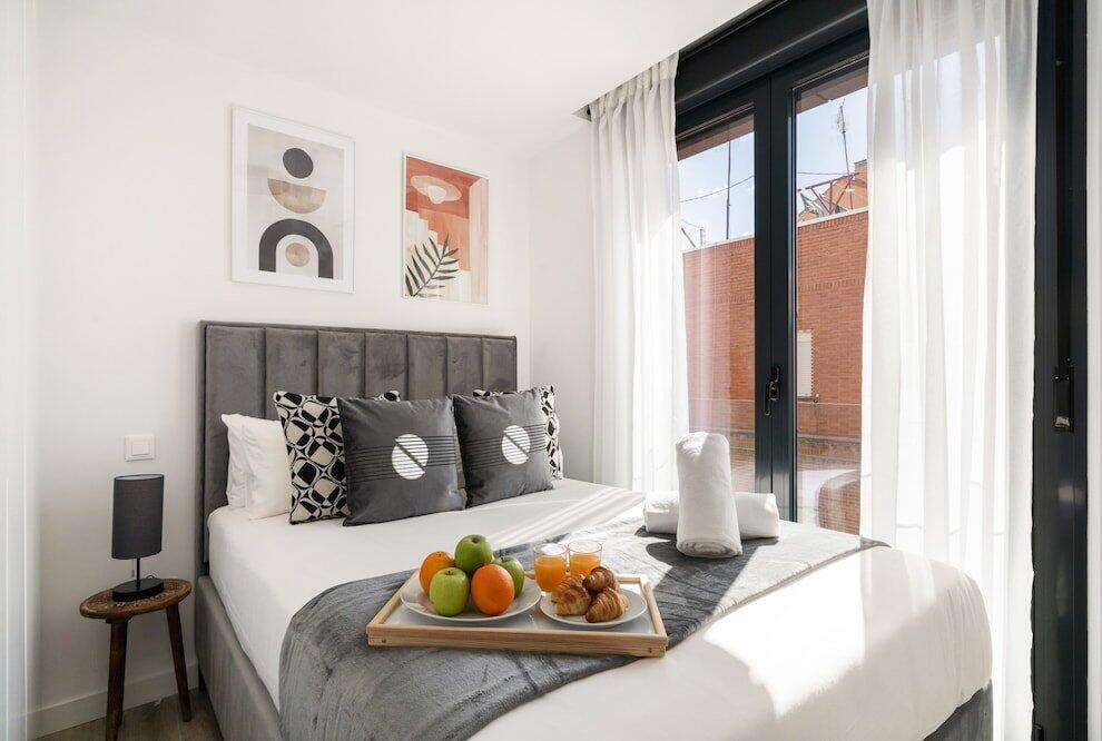 Foto de una habitación de Aparthotel dobohomes - EG13