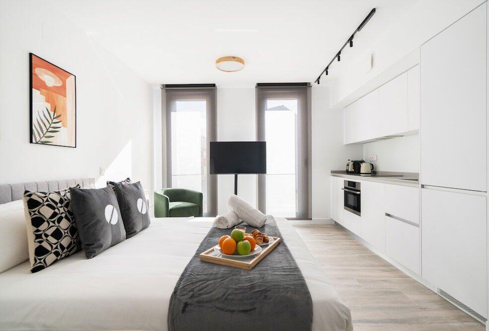 Foto de una habitación de Aparthotel dobohomes - EG13