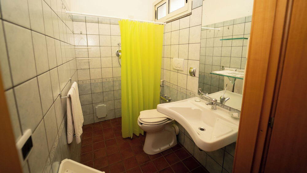 Foto del baño de Hotel Calipso