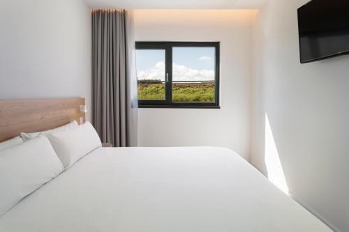 Foto de una habitación de B&amp;amp;B HOTEL Écija