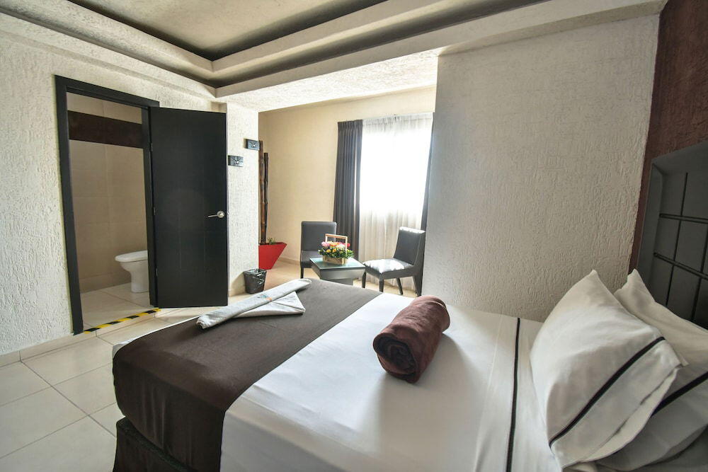 Foto de una habitación de Hotel Portonovo Plaza Centro