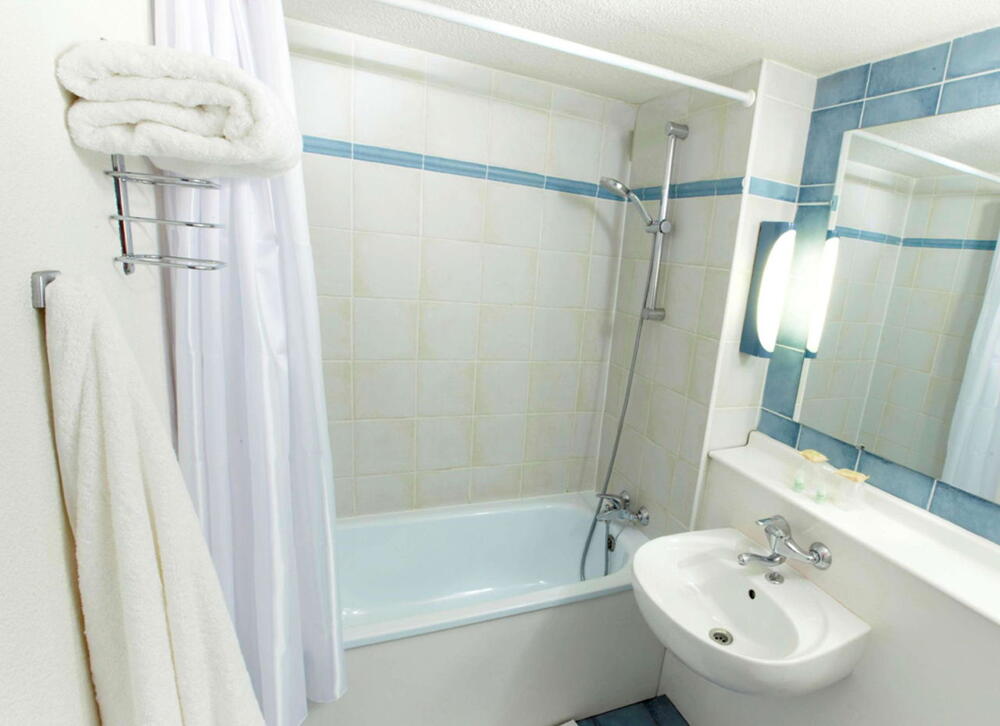 Foto del baño de Kyriad Direct Le Bourget Gonesse