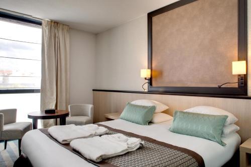Foto de una habitación de Hotel Mercure Vichy Thermalia