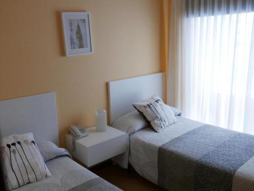 Foto de una habitación de Hotel Cais