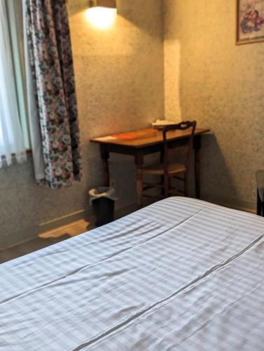 Foto de una habitación de Hotel du Saumon