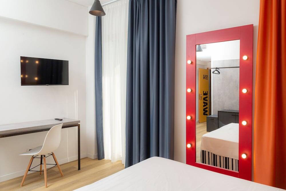 Foto de una habitación de Wave Hotel