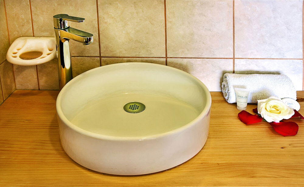 Foto del baño de Hotel Polo Corporativo