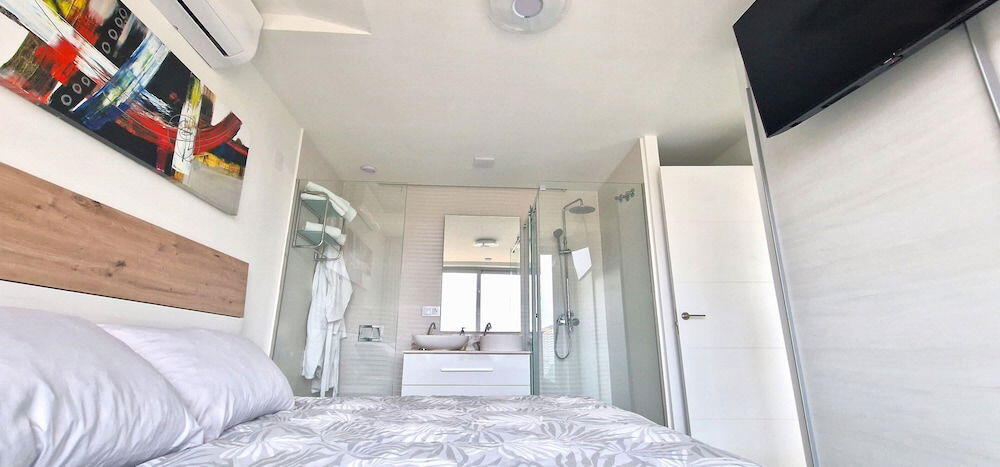 Foto de una habitación de Apartamentos Oasis de la Cala
